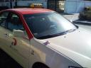 Red roof taxi.